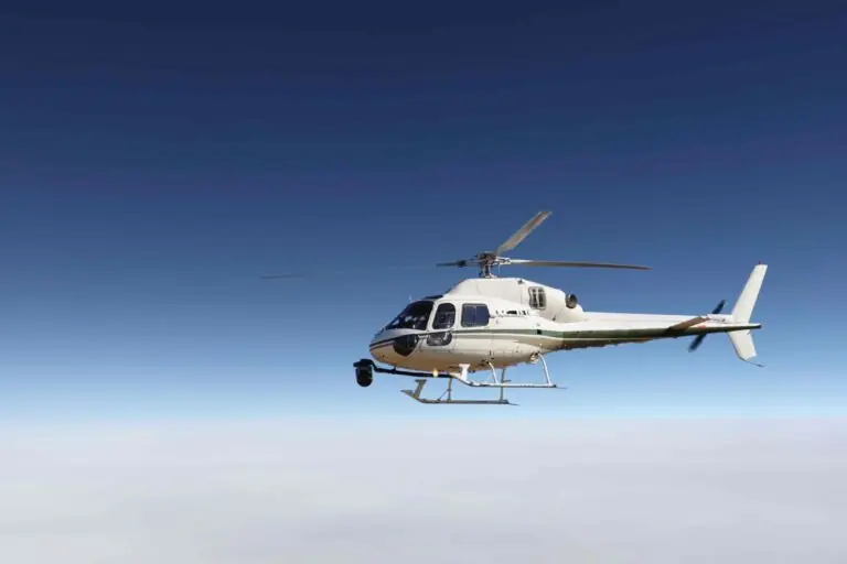 Helicopter flying in clear blue sky for aviation and charter services